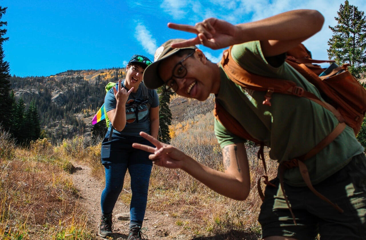 A group of BIPOC folks enjoy their time connecting to an old growth american sycamore on the ancestral lands of the Muheconneok